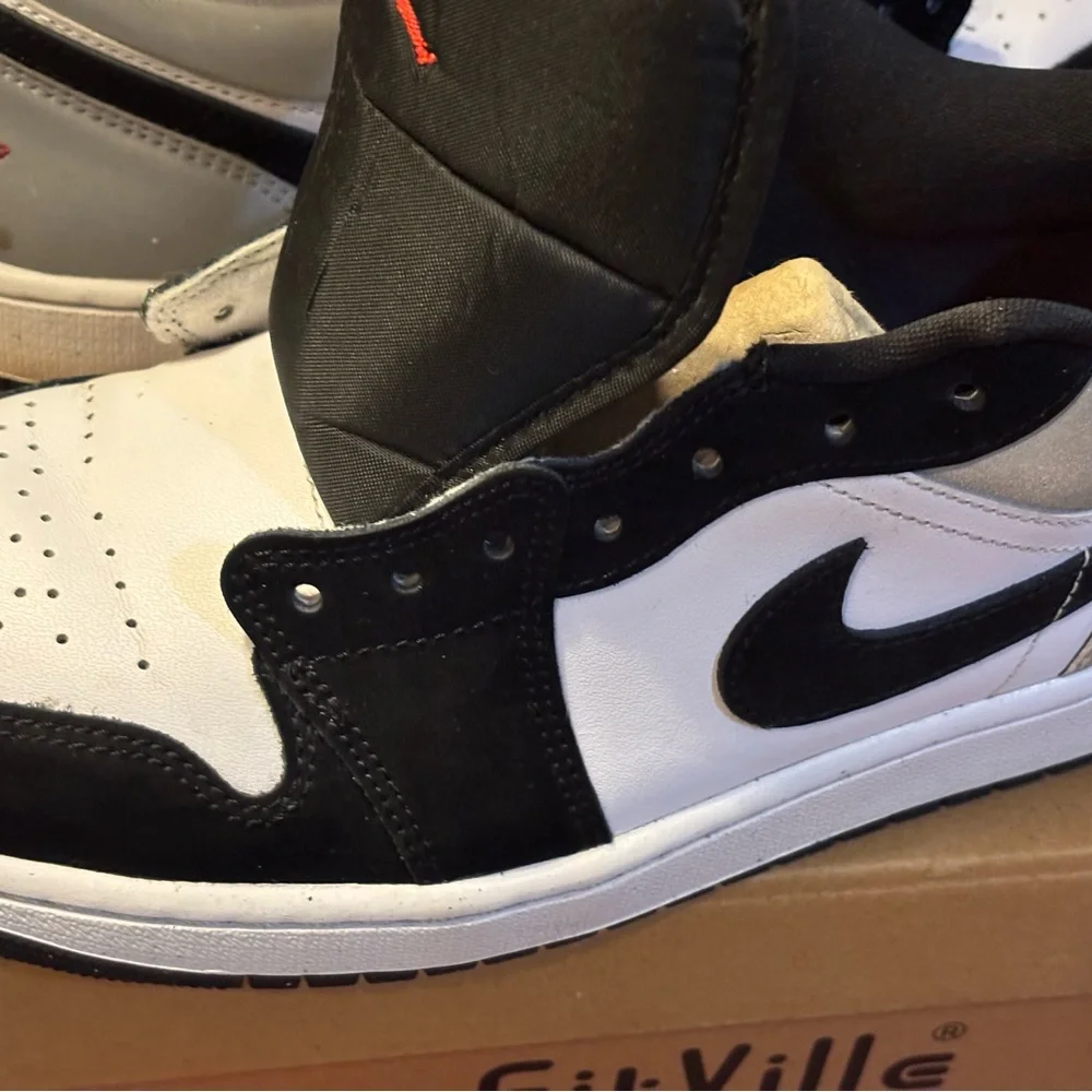 Jordan Black and White Athletic Shoes with Red Accent